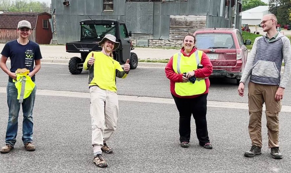 Community members gather to clean up ditches