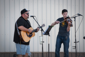 Matt & Greg perform during a 2024 Back Alley Jam. 